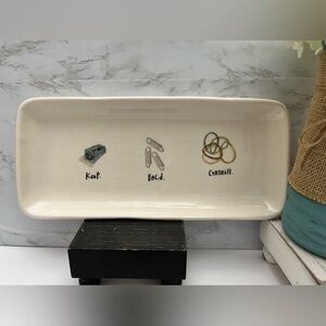 Exclusive EUC Magenta brand office platter says “KEEP HOLD CONTAIN”